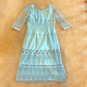 Custom-made blue dress with beautiful detailing